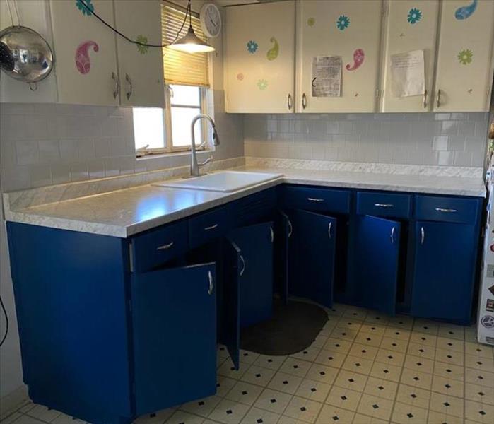 Blue cabinets after being remodeled 